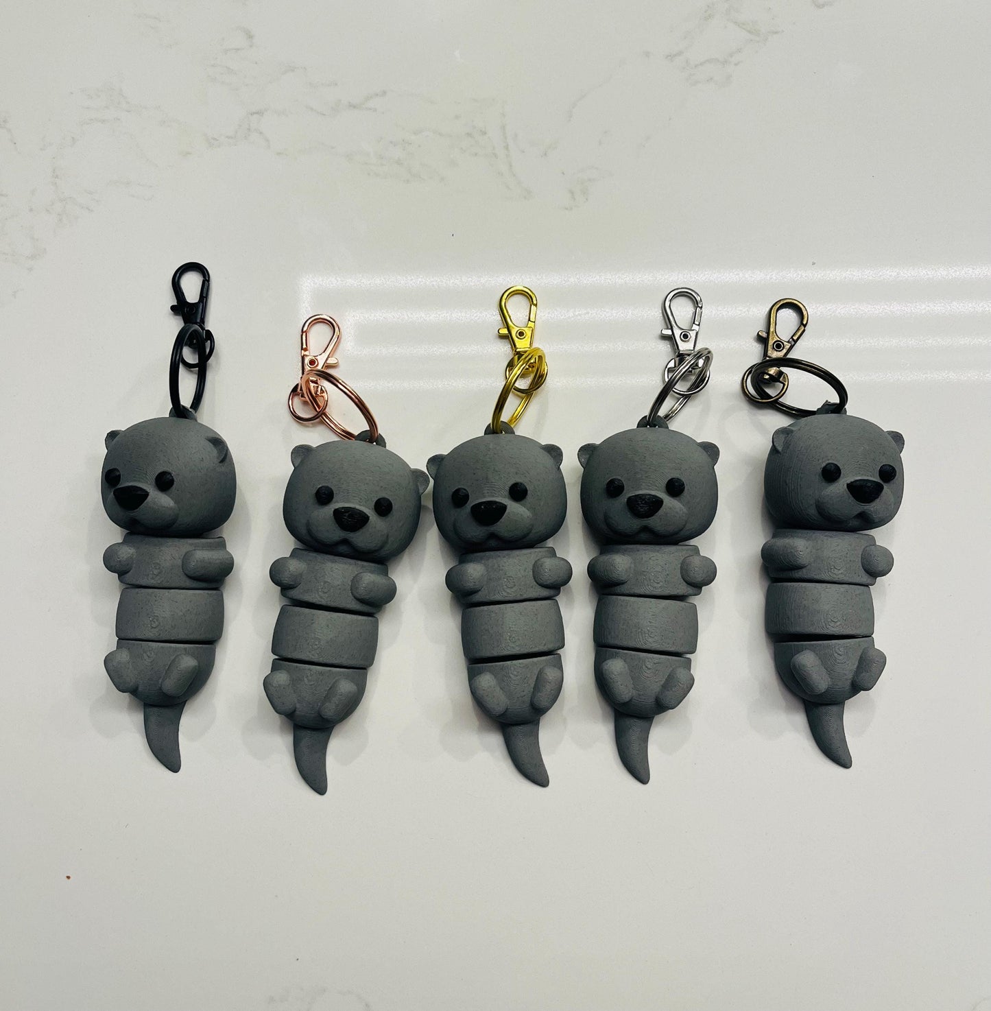 Articulated Otter Keychains