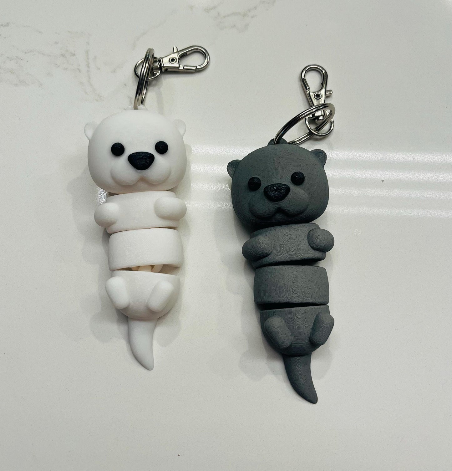 Articulated Otter Keychains