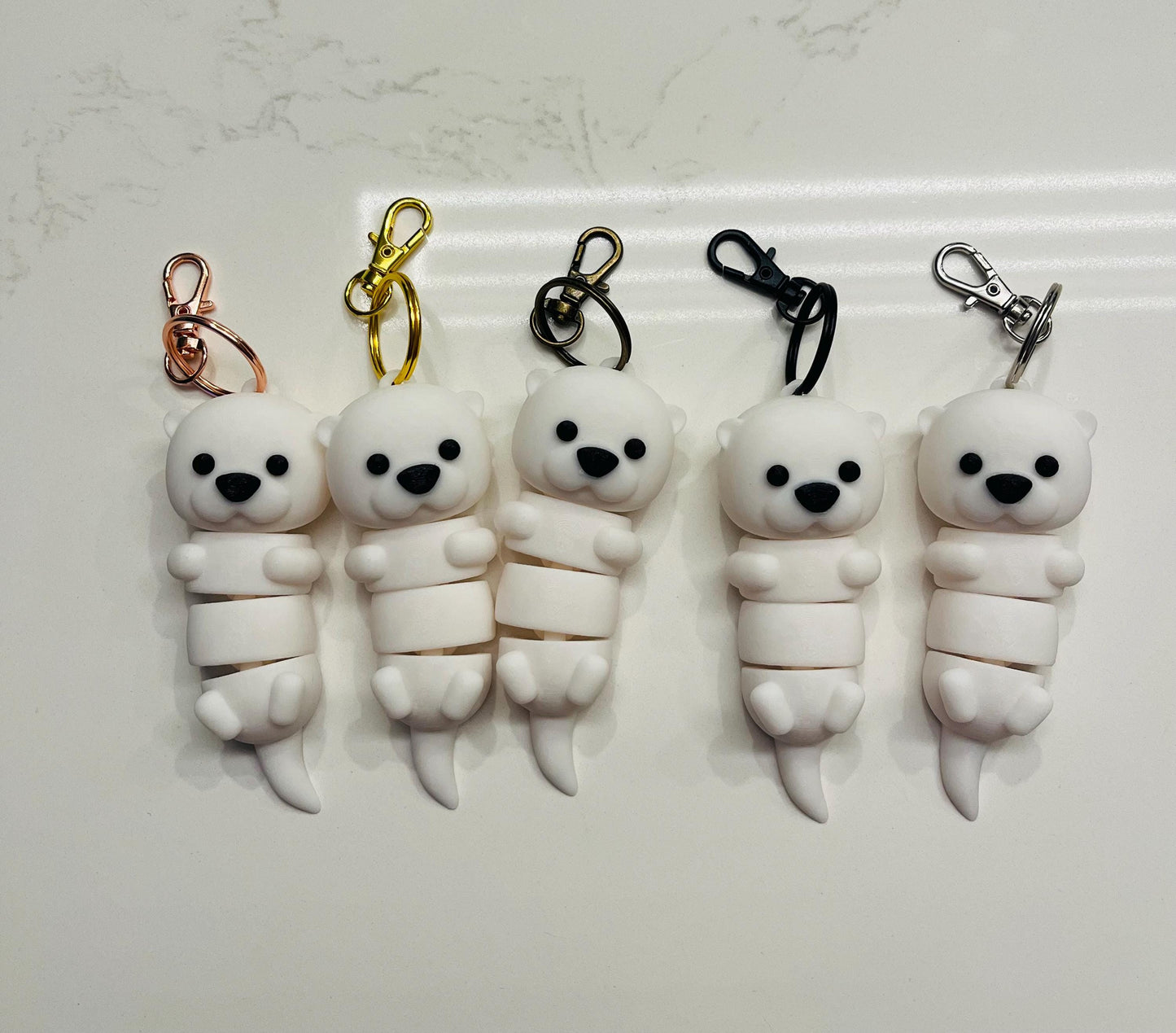 Articulated Otter Keychains